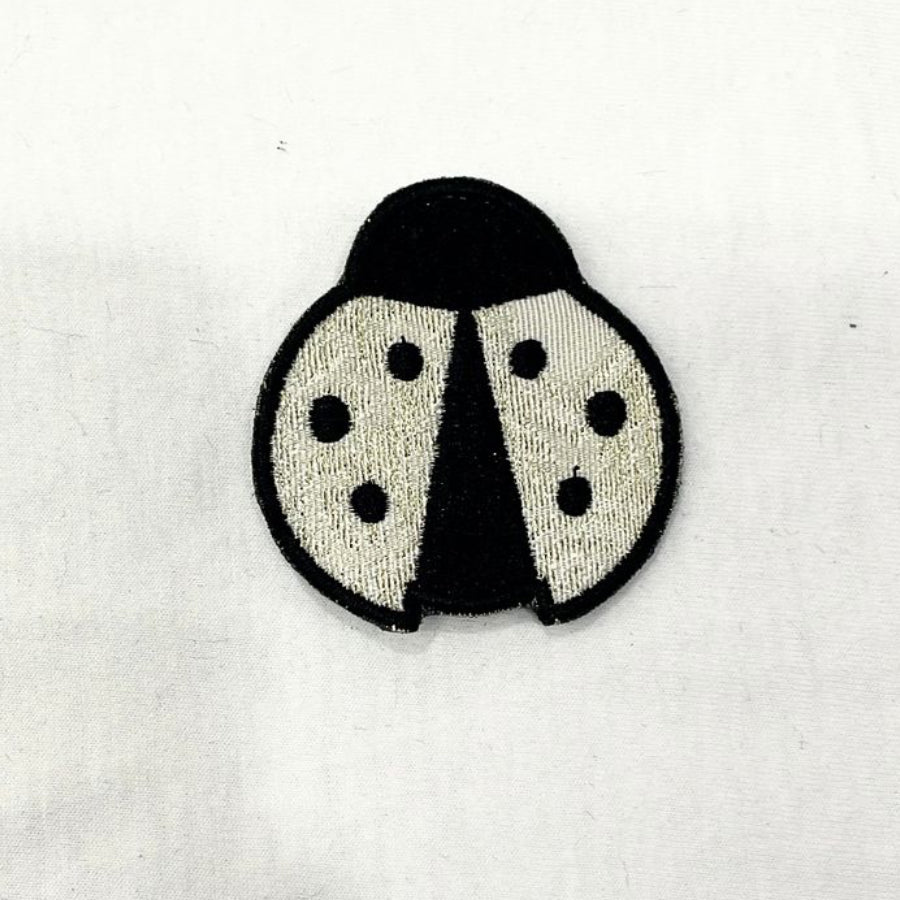 PIN LADYBUG BEIGE