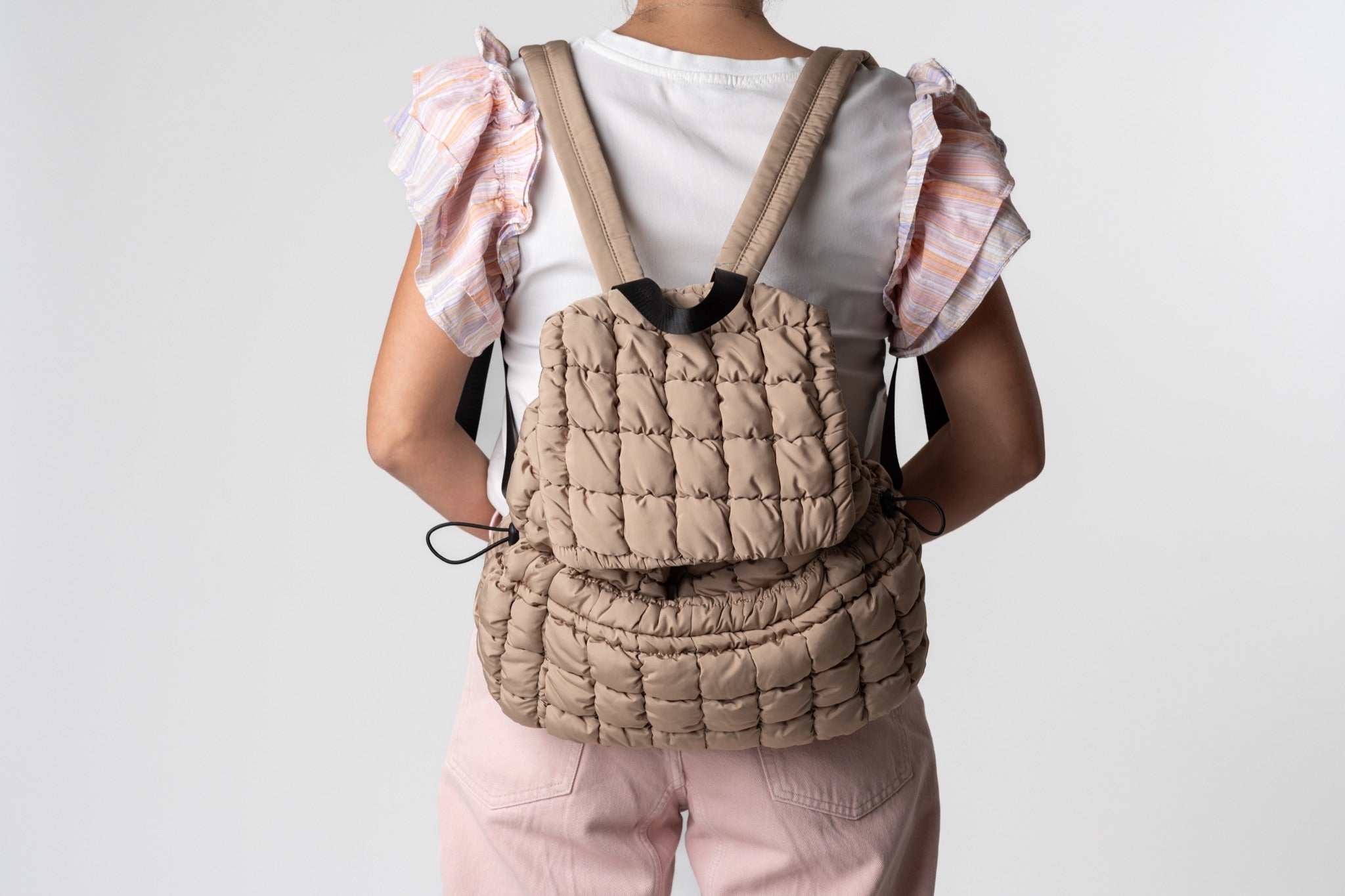 PUFFER BACKPACK WEARING 2